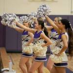 Sequim Gazette photo by Matthew Nash/ Sequim cheerleaders encourage audience members on Jan. 26 at home against North Mason.