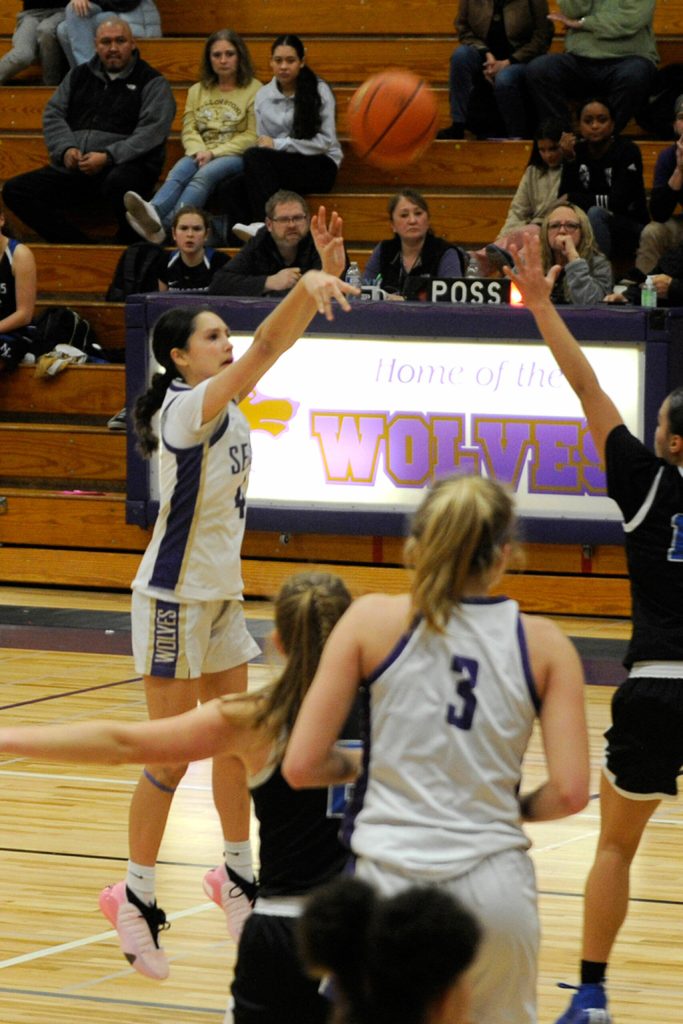 Sequim Gazette photo by Matthew Nash/ Sequims Gracie Chartraw goes for a shot on Jan. 26 against North Mason. Sequim won 73-66.