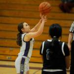 Sequim Gazette photo by Matthew Nash/ Sydney Thomas-Harris shoots one of three free throws as a substitute for teammate Libby Turella after she was poked in the eye during a play. Sequim won 73-66 over North Mason.