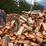 Sequim Gazette photo by Michael Dashiell / Ron Long, left, and Jack Tatom chat in a rare break between cutting wood for their groups efforts to help the Path From Poverty nonprofit.