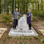 Photo courtesy of Steve Nordwell 
Steve Nordwell and daughter Hillary stand in Stravberk, Slovenia, near a monument to the crew of B-24 that was shot down in Nazi-occupied territory in March 1944. The bomber was ninckmnamed Moo Juice.