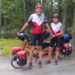 Photo courtesy of Jeff and Louise Davis / Jeff and Louise Davis  pictured here with Little Red, their two-wheeled transportation for their canoeing adventure  offer their thoughts of their 700-mile canoeing, by bike trip up the coast of Maine on March 7 at a 2024 Travelers Journal Series event.