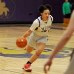 Sequim Gazette photo by Matthew Nash/ Gracie Chartraw drives against Olympic players on Feb. 1.