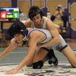 Sequim Gazette photo by Michael Dashiell / Cayden Beauregard of Sequim (top) wrestles Xion Horne of Olympic in the 113-pound weight class time match at a sub-regional tournament in Sequim on Feb. 3. Beauregard won by pin in 3:13.