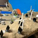 Sequim Gazette photo by Matthew Nash/ Team Ramaal Hara of Brayden Baritelle, Shay Lucier and Rivers Maynard featured a repurposed R/C car turned into a fan and lights for their desert Future City.