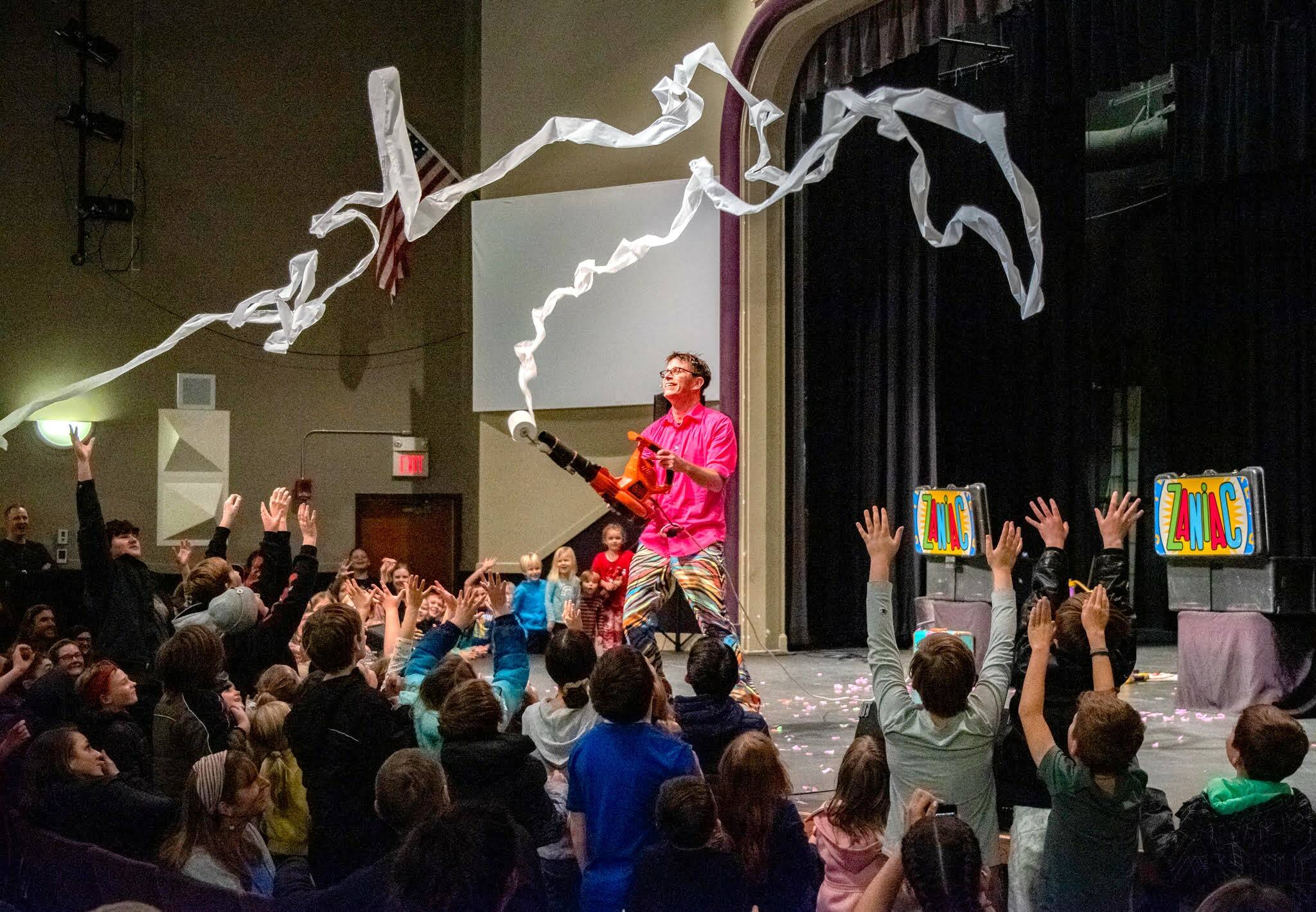 Sequim Gazette file photo by Emily Matthiessen / Children enjoy the grand finale of a performance full of songs, tricks, jokes and props by Alex Zerbe, a.k.a. the Zaniac, at the Sequim High School auditorium in February 2023. Zerbe returns to Sequim for a show at 6 p.m. on Friday, Feb. 9.