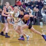 Photo by Keith Thorpe/Olympic Peninsula News Group
Sequims Graciela Chartraw, front, drives past Port Angeles Izzy Felton as teammate Hailey Wagner looks on during a Feb. 6 match-up in Port Angeles.