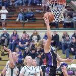 Keith Thorpe/Olympic Peninsula News Group / Sequims Jolene Vaara reaches for the hoop surrounded by, from left, Port Angeles Lexie Smith and Paige Mason and teammate Hailey Wagner on Feb. 6 in Port Angeles.