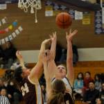 Sequim Gazette photo by Michael Dashiell / Sequims Hailey Wagner, center, battles Enumclaws Emma Holt, left, and Sydney VanHoof for a rebound in the first half of the Wolves 66-49 loss to the visiting Hornets in a bi-district tourney opener on Feb. 14.