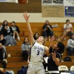 Sequim Gazette photo by Michael Dashiell / Sequims Jolene Vaara, left, drives to the basket for two of her career-high 40 points in a big SHS win over North Mason in a bi-district tournament game on Feb. 16.