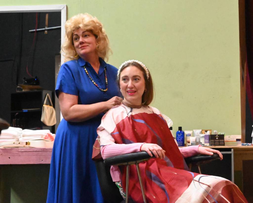 Sequim Gazette photo by Michael Dashiell / Jennifer Saul (as Truvy), left, and Sunshine Petersen (as Shelby) rehearse the second act of Olympic Theatre Arts Steel Magnolias.