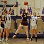 Sequim Gazette file photo by Michael Dashiell / Sequims Jolene Vaara (3) and Gracie Chartraw (4) defend the basket at Enumclaws Kalee Swanson passes to teammate Ava Smith in a bi-district tournament game on Feb. 14 in Sequim. Vaara was selected the Olympic Leagues Most Valuable Player and Defensive Player of the Year while Chartraw was named to the all-league first team.