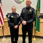 Sequim Gazette photo by Matthew Nash/ Det. Sgt. Kori Malone with Port Angeles Police Department stands with partner Mike Hill after he was named the new Sequim Police Chief. The couple met while working in Sequim, Hill said.