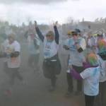 Sequim Gazette photo by Michael Dashiell / Runners and walkers break from the start line at the Sequim Sunshine Festival Sun Fun Color Run at Carrie Blake Community Park on March 2.