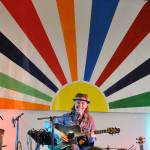Sequim Gazette photo by Matthew Nash/ Harmonica Pocket plays inside the Guy Cole Event Center during the Sequim Sunshine Festival on March 2 as some zealous children dance nearby.