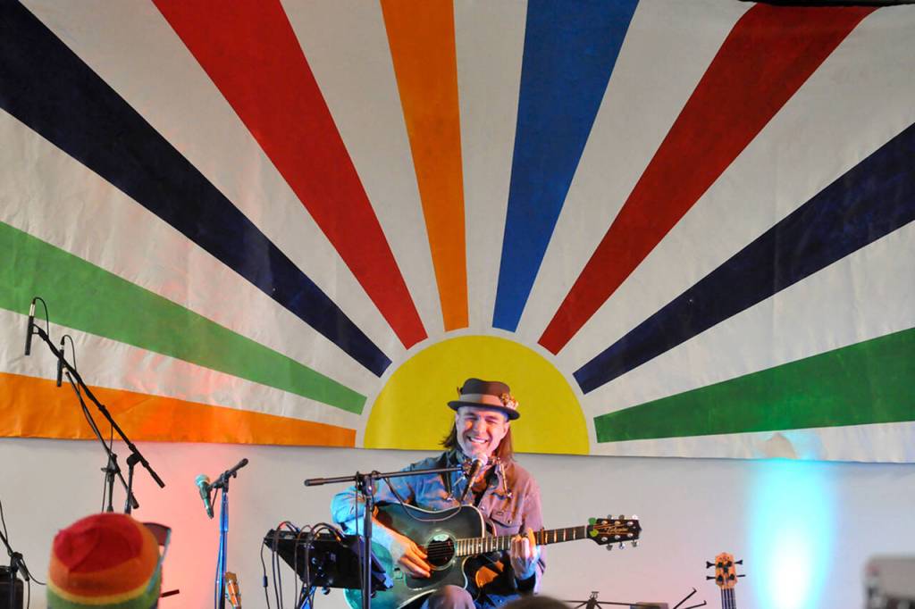Sequim Gazette photo by Matthew Nash/ Harmonica Pocket plays inside the Guy Cole Event Center during the Sequim Sunshine Festival on March 2 as some zealous children dance nearby.