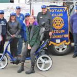 Photo courtesy of Sequim Noon Rotary / Sequim Noon Rotary members present an adaptive tricycle to representatives from Camp Beausite Northwest in January 2023. Pictured, from left, are Rotarian Judy Shanks; Camp Beausite Northwests executive director Raina Baker; Rotarians Stuart Dille, Mary Budke, Anna Richmond, Ted Shanks and Margot Hewitt; camp community development coordinator Tinna Barnet, and Rotarians Ren Garypie, Don Sorensen, Bob Macaulay and Kelly Macaulay.