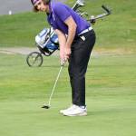 Sequim Gazette file photo by Michael Dashiell / Sequims Lars Wiker putts during a match against Olympic at The Cedars at Dungeness in 2023.