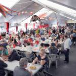 File photo by Keith Thorpe/Olympic Peninsula News Group
Crowds pack the main dining tent at the Dungeness Crab and Seafood festival near the Port Angeles waterfront in 2022.