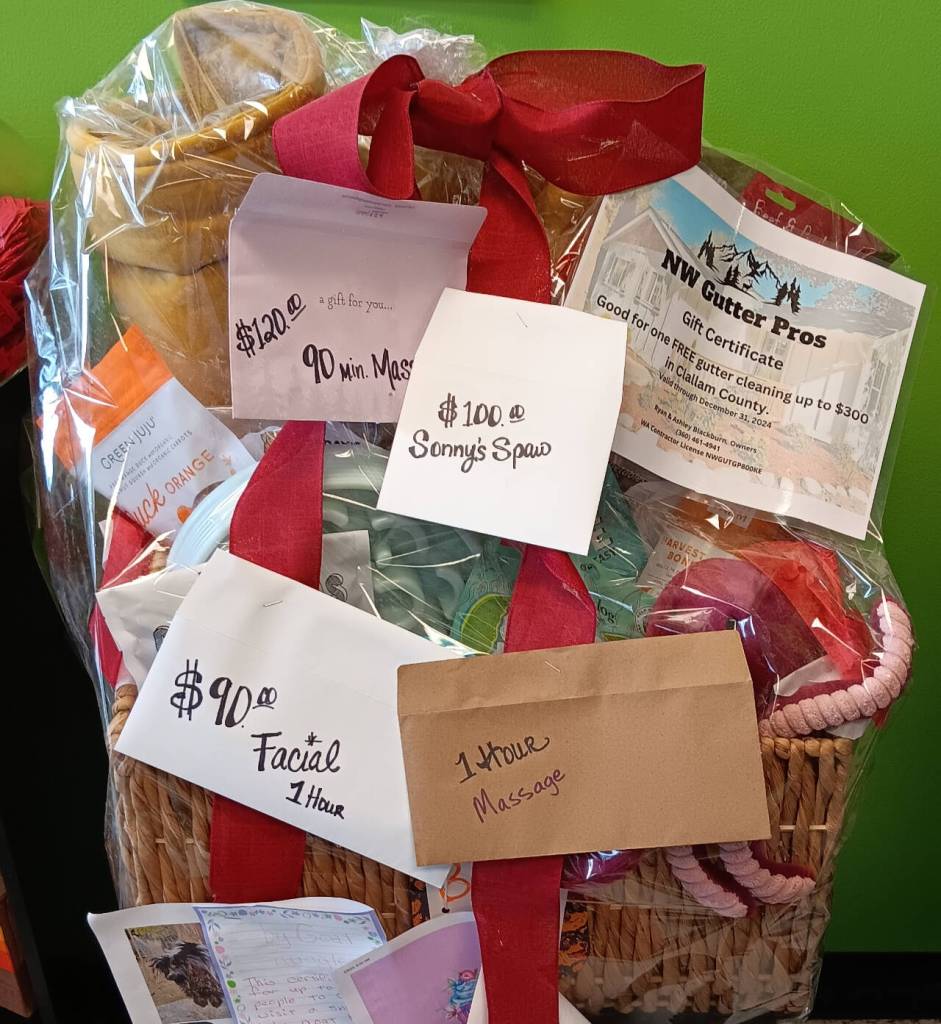 Photo courtesy of Welfare for Animals Guild / A gift basket at a fundraiser at Sonnys Spaw and Self Wash on March 3 raised $3,000 for care of Casey, a rescued dog who suffered from severe hunger and a gunshot wound.