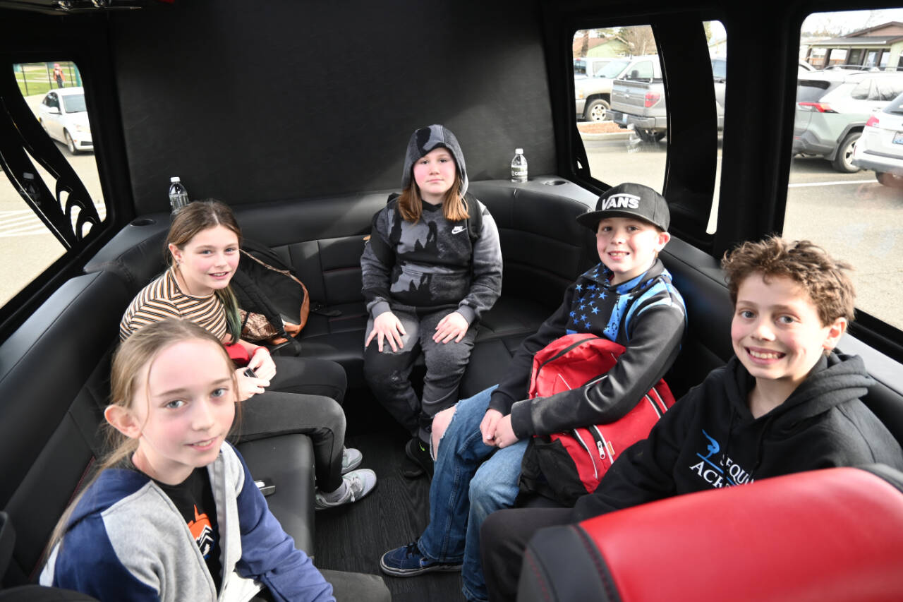 Sequim Gazette photo by Michael Dashiell / Kharmyn Pickens (center), a fifth-grader in Robin Forrests class at Helen Haller Elementary School was the schools top fundraiser for the Turkey Trot, raising $885 out of the events $25,432.58 total. The effort earned Pickens and friends (from left) Zephyr Register, Ella Ulin, Kamdyn Galbreath and Greyson Humphries, an after-school ride for frozen yogurt and back home from 7 Cedars Resort on March 13. The Turkey Trot this year raised funds for several school projects, including 6 Books For Summer, an alumni scholarship, teacher and staff appreciation events and special teacher request projects.