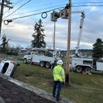 Sequim Gazette photo by Matthew Nash/ Clallam PUD crews worked through the night/morning of March 12 to replace a power pole and restore electricity after a sport utility vehicle struck a power pole.