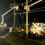 Photo courtesy Clallam PUD/ Clallam PUD crews worked through the night/morning of March 12 to replace a power pole and restore electricity after a sport utility vehicle struck a power pole.