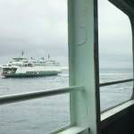 Photo by Aspen Anderson/Washington State Journal / A Washington State ferry is viewed from the car deck of another ferry on the Fauntleroy route that serves Vashon Island, Southworth in Kitsap County and West Seattle. Photo by Aspen Anderson