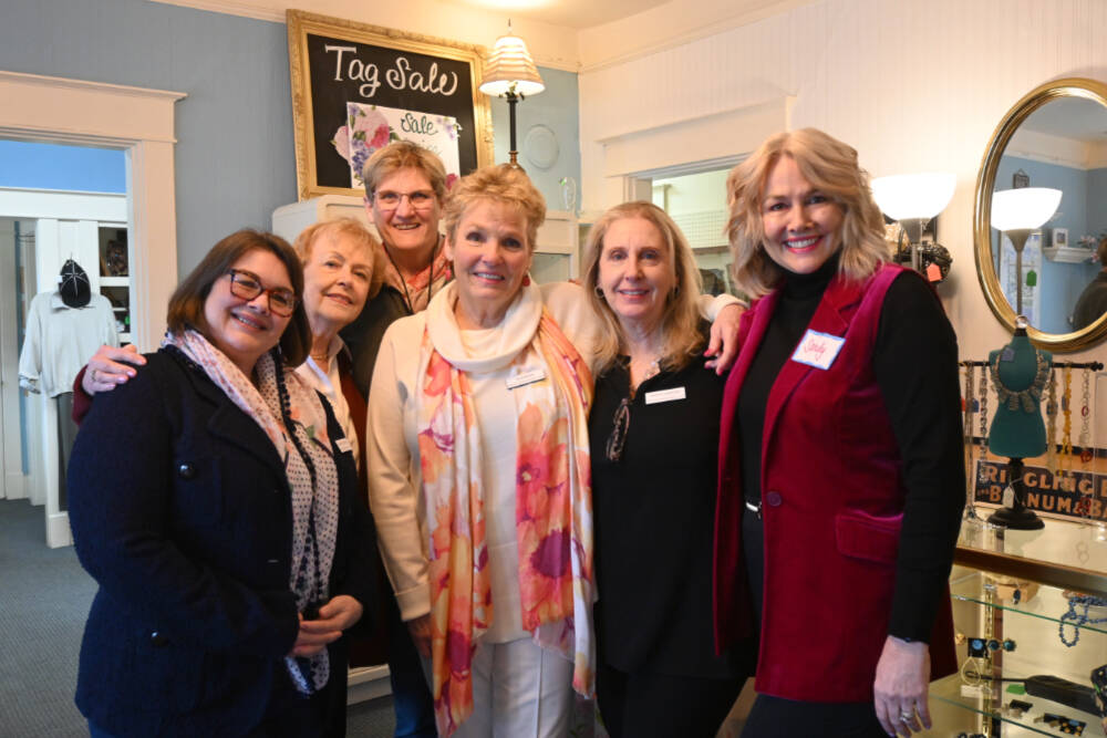 Sequim Gazette photo by Michael Dashiell / The Sequim Hospital Guild Thrift Shop at 204 W. Bell Street will be open from10 a.m.-4 p.m. Thursday, Friday and Saturday, March 21-23. There are plenty of changes inside and out of the shop, which reopened earlier this month after a seasonal closure. Donations accepted and appreciated between 10 a.m.-1 p.m. on Mondays and Tuesdays, and when the shop is open for business. The group is accepting new volunteers. Pictured at the shop  along with Susan Sorenson of KSQM 91.5 FM (in back)  are the guilds current board members: interim treasurer Patti Christie; secretary Brenda Clark; president Deborah Carlson; interim treasurer Patti Christie, and interim vice president Sandra Berryhill-Huish. Not pictured is donations manager Randi Cooper.