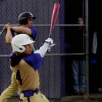 Sequim Gazette photo by Michael Dashiell / Sequims Bryant Laboy laces a single into left field as the Wolves take on North Kitsap on March 21.