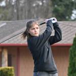 Sequim Gazette photo by Michael Dashiell / Sequims Raimey Brewer tees off at hole No. 1 at The Cedars at Dungeness on March 21 in a matcha against Bainbridge.