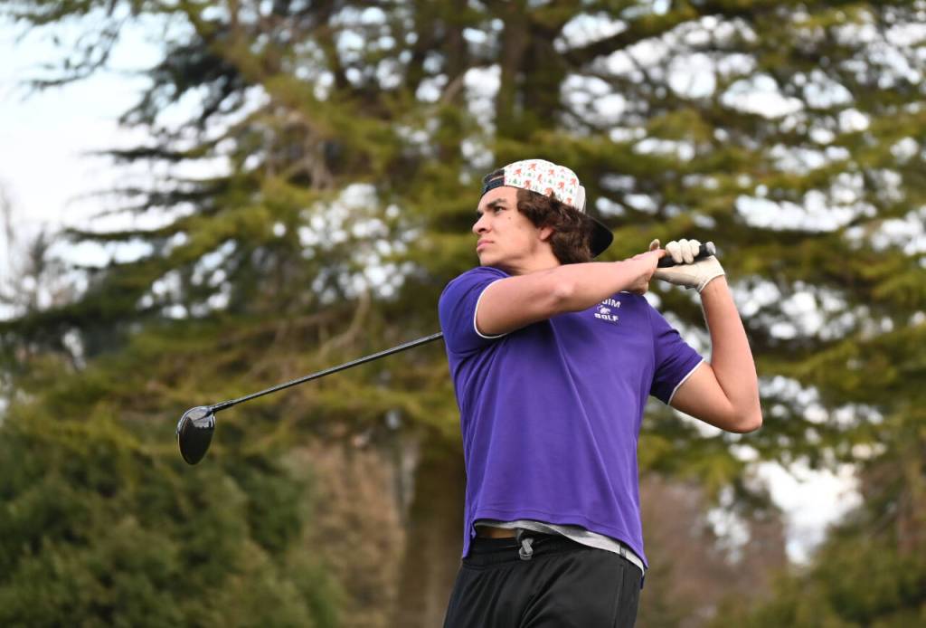 Sequim Gazette photo by Michael Dashiell / Sequims Lars Wiker wacthes a drive at The Cedars at Dungeness on March 21 as the Wolves take on Bainbridge.
