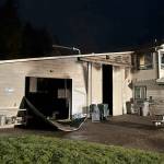 Photo courtesy Clallam County Fire District 3/ A fire spread from a garage into an adjoining house on March 21 on the 1200 block of Holland Road.