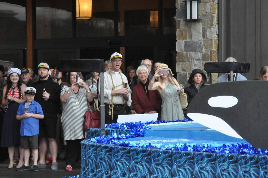Sequim Gazette photo by Matthew Nash/ A crowd cheers for the new royalty float on March 23 at 7 Cedars Casino.