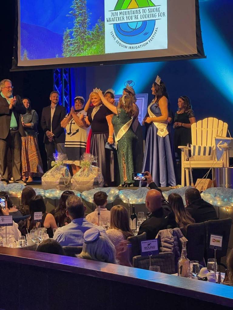 Photo by Eran Kennedy/Olympic Peninsula News Group 
Sequim irrigation Festival organizers honor Lynn Horton for her years of service as royalty mom at the March 23 Festival Kick-Off Dinner.