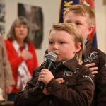 Sequim Gazette photo by Michael Dashiell / Junior American Eagles Donnie (8) and Henry (10) Fors lead the Pledge of Allegiance at a ceremony honoring Vietnam War veterans at the Sequim VFW on March 27.