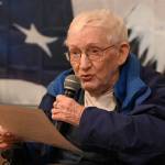 Sequim Gazette photo by Michael Dashiell / World War II veteran Richard Hazelton, 99, sings Bell Bottom Trousers at a March 27 ceremony in Sequim honoring Vietnam War veterans.