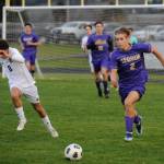 Sequim Gazette photo by Michael Dashiell / Sequims Preston Kurtze, right, dribbles downfield and looks for a teammate in the Wolves 3-2 loss against Bainbridge on March 26.
