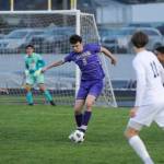 Sequim Gazette photo by Michael Dashiell / Sequims Colin Feik, center, looks to keep possession as hes surrounded by Bainbridge players in the Wolves home game against the Spartans on March 26.