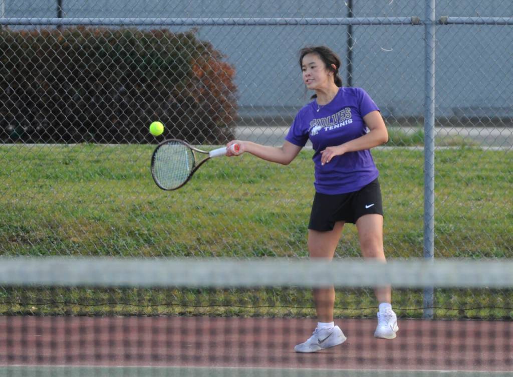 Sequim Gazette photo by Michael Dashiell / Sequims Tiffany Lam returns a shot in singles play agains Bainbridges Ruby Morrow on April 9.