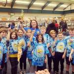 Photo courtesy Tennille Bixby/ Helen Haller Elementarys teams for the North Olympic Library Systems Battle of the Books, featured, from left, Miles Angelovic, Winter Radcliffe, Mia Miano, Ramsey O Mera, Rain Nelson, Marley Eaton, Colin Bixby, Emery Kompackdee, Parker Horst, Preston DeAngelo, and Wade McCarthey. Fourth grade teacher Keely Oberly, holding the Blue Titans trophy, oversaw the program at the school.