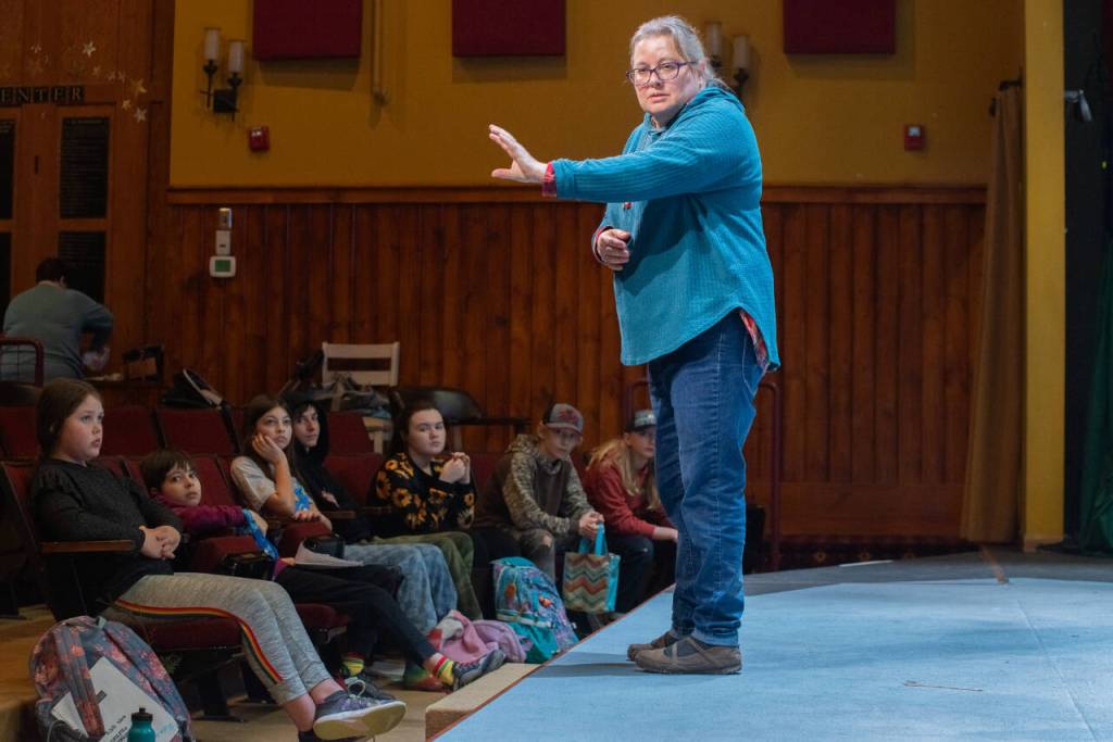 Photo by Emily Matthiessen / Marissa Meek holds the attention of her young students half-way through Olympic Theatre Arts most recent iteration of the youth program. Meek, who has more than 27 years of youth theater instructor experience, is co-directing with Taylor Dowling the programs production of Plays From African Folktales.