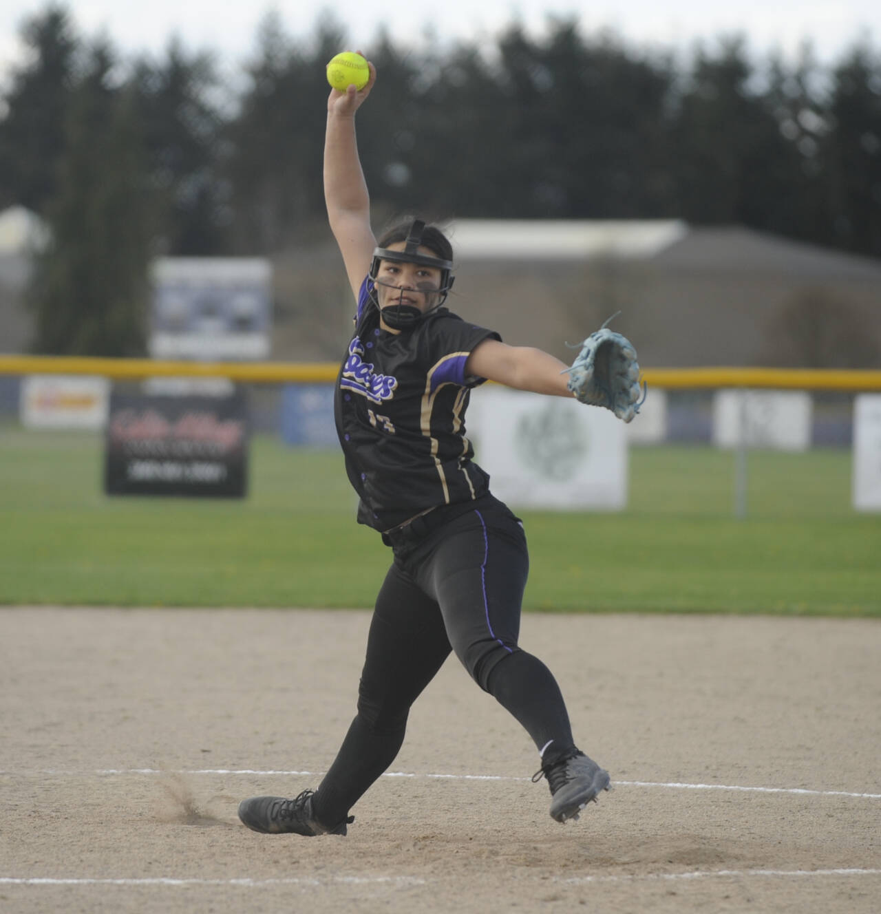 Sequim Gazette photo by Michael Dashiell / Sequims Taylee Rome looks to keep Kingston bats at bay in an Olympic League game in Sequim on April 9.
