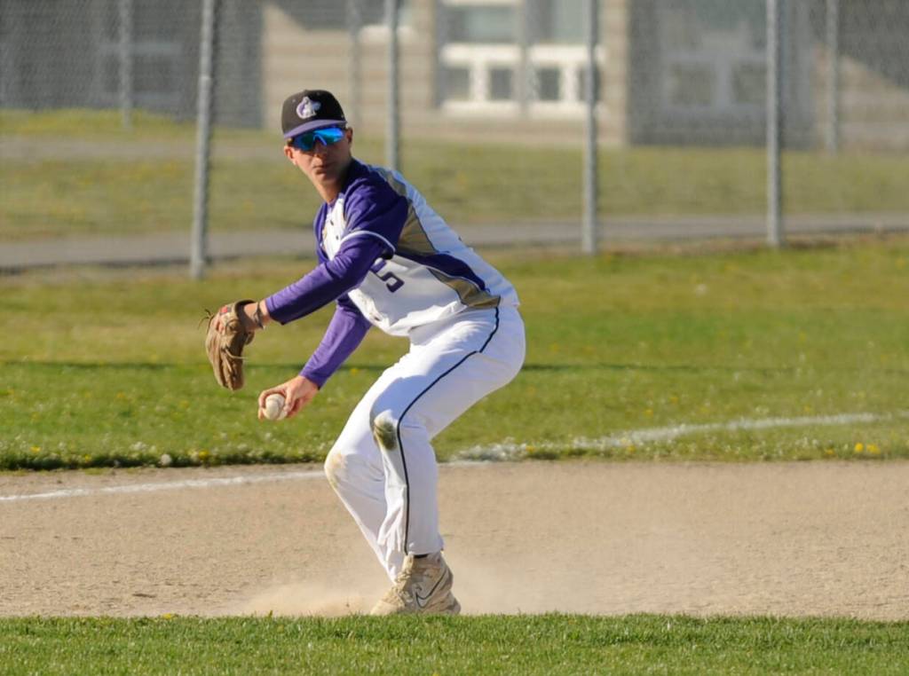 Sequim Gazette photo by Michael Dashiell / Sequims Hunter Tennell throws out a Port Angeles batter in the fifth inning of the Wolves 7-4 loss to PA on April 12. Tennell was 1-for-3, reached base three times and had an RBI in the defeat.
