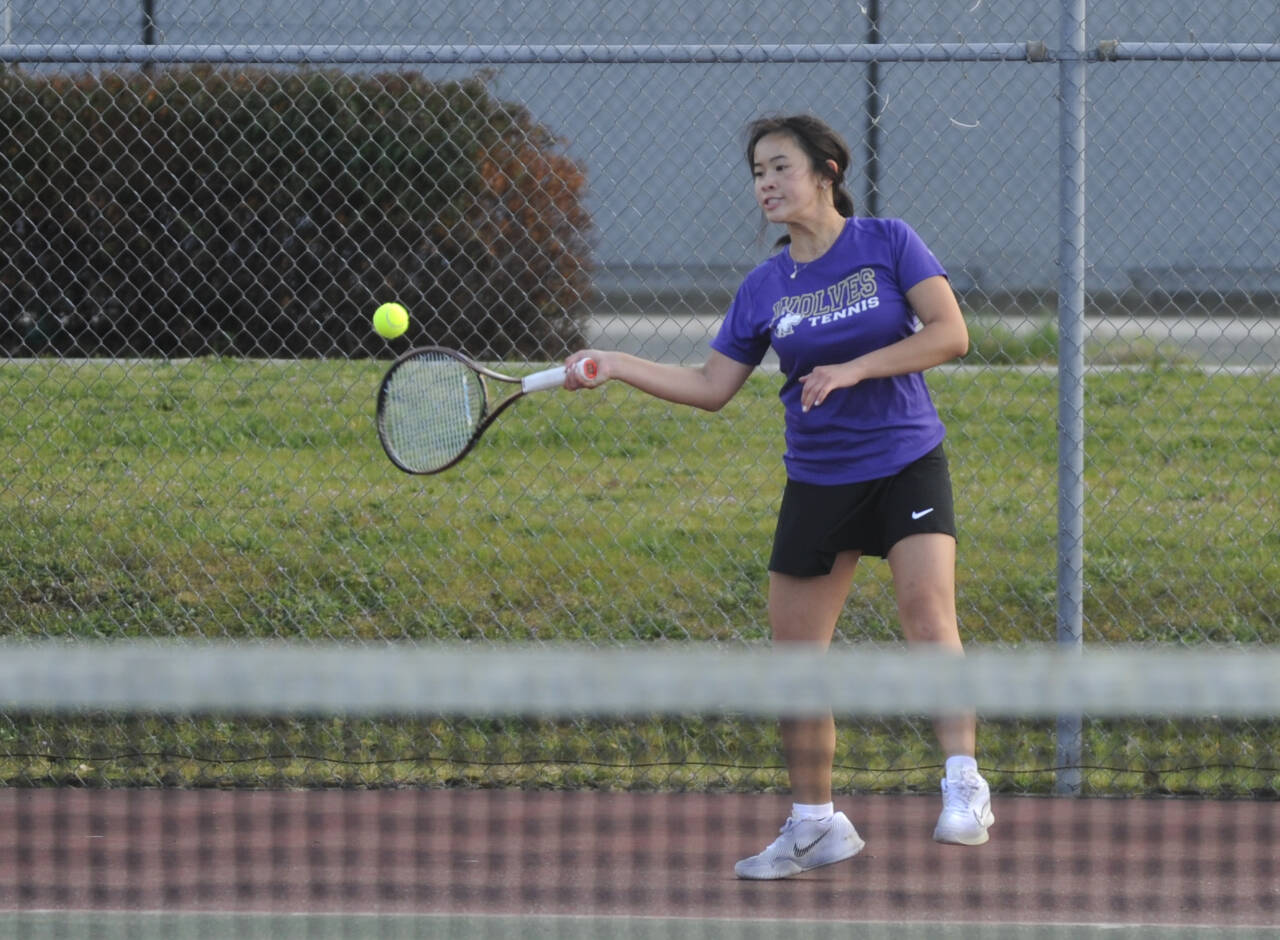 Sequim Gazette photo by Michael Dashiell
Sequims Tiffany Lam returns a shot in singles play agains Bainbridges Ruby Morrow on April 9. Lam improved to 10-1 on the season with three singles wins last week.