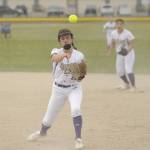Sequim Gazette photo by Michael Dashiell / With teammate Taylee Rome looking on, Sequim second baseman Mia Kirner throws out a Klahowya running in a non-league match-up on April 20.