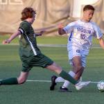 Photo by Keith Thorpe/Olympic Peninsula News Group / Sequims Mekhi Ashby, right, fends off Port Angeles Grant Butterworth on April 16 at Peninsula College.