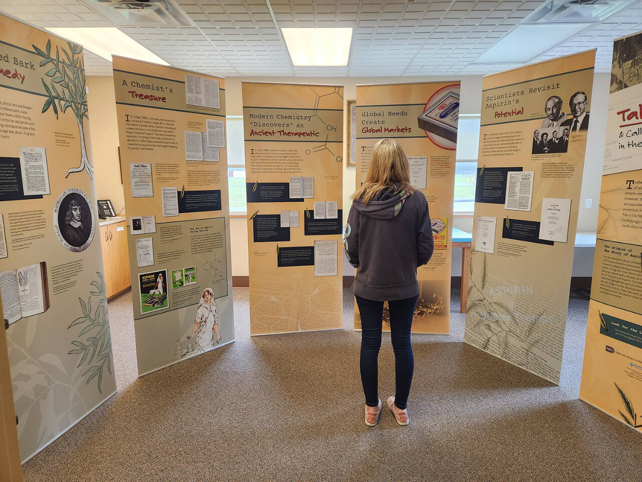 Photo courtesy of North Olympic Library System
The Story of Aspirin Revisited, was displayed in early April at the Clallam Bay Library (pictured) and is now at the Sequim Library temporary location through May 11.