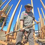 Photo by Jay Cline / John Brewer, former editor of the Peninsula Daily News and publisher of the PDN, Sequim Gazette and the Forks Forum, and other volunteers help rebuild the Dream Playground in Port Angeles. Brewer died while on a fishing trip in Montana last week.