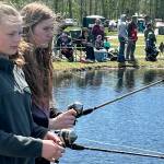Grace Dormer, and Zoei McCullem, both 13 and from Sequim, cast lines out for fish on Kids Fishing Day. The friends said theyve both attended the event before.